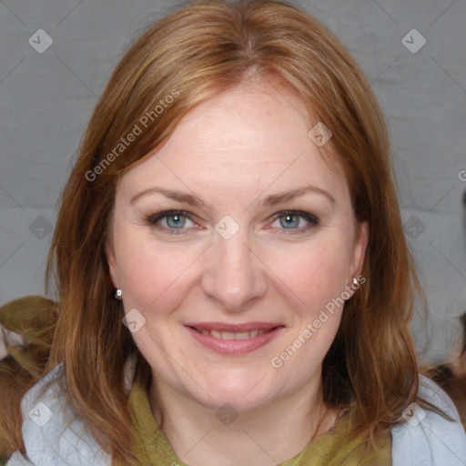 Joyful white adult female with medium  brown hair and blue eyes