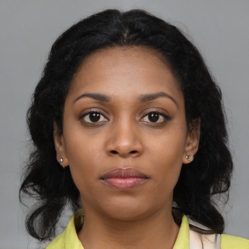 Neutral black young-adult female with long  black hair and brown eyes