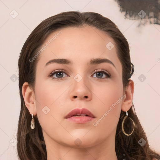 Neutral white young-adult female with long  brown hair and brown eyes