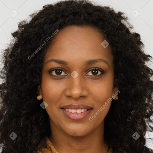 Joyful black young-adult female with long  brown hair and brown eyes