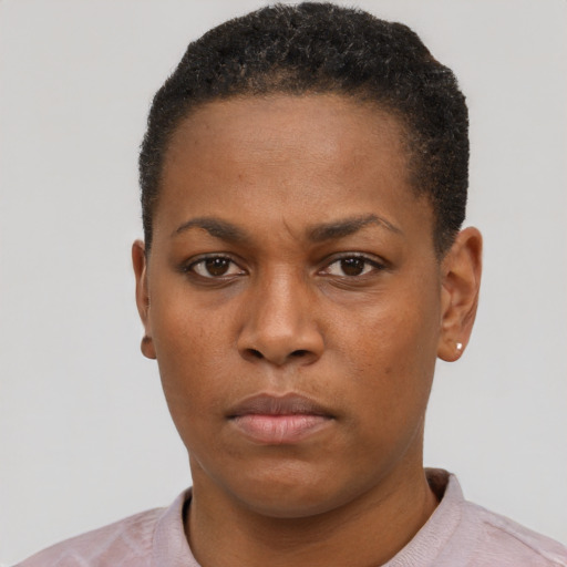 Neutral black young-adult female with short  brown hair and brown eyes