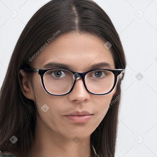 Neutral white young-adult female with long  brown hair and brown eyes