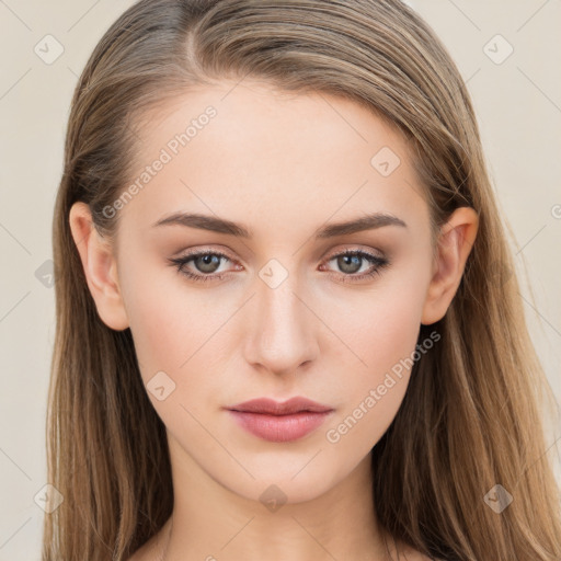 Neutral white young-adult female with long  brown hair and brown eyes