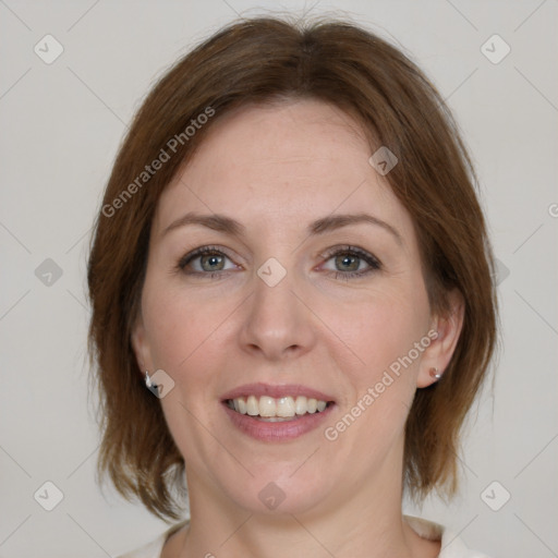 Joyful white young-adult female with medium  brown hair and green eyes