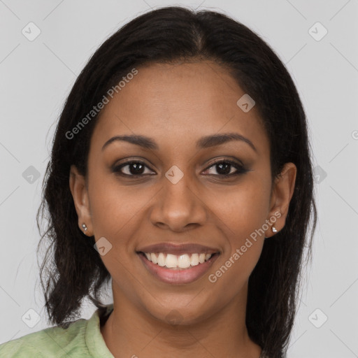 Joyful black young-adult female with medium  brown hair and brown eyes