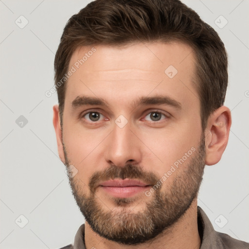 Neutral white young-adult male with short  brown hair and brown eyes