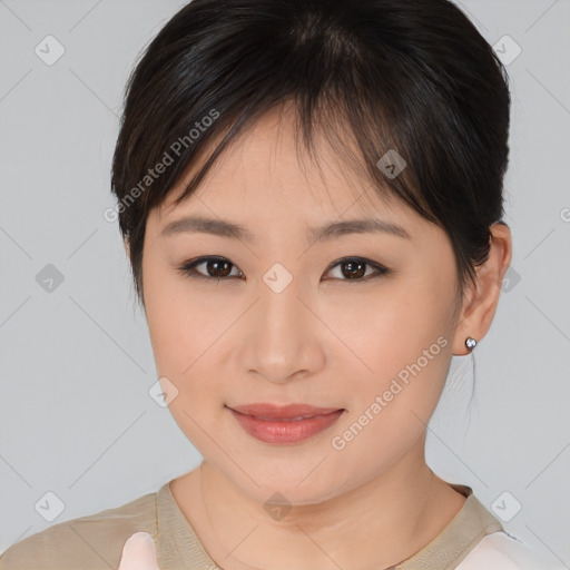 Joyful asian young-adult female with medium  brown hair and brown eyes