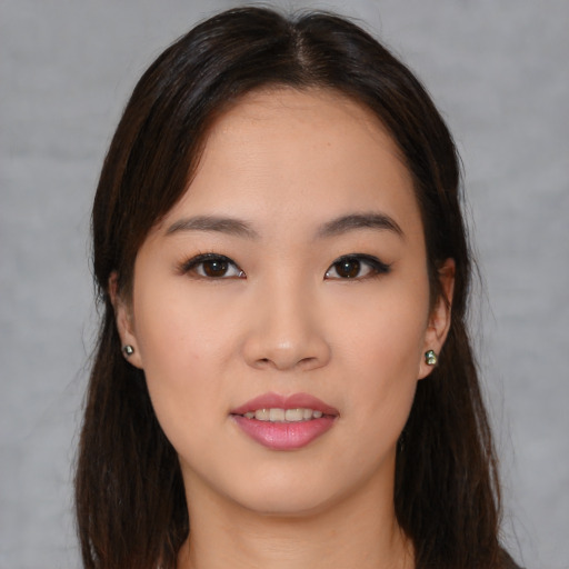 Neutral asian young-adult female with long  brown hair and brown eyes