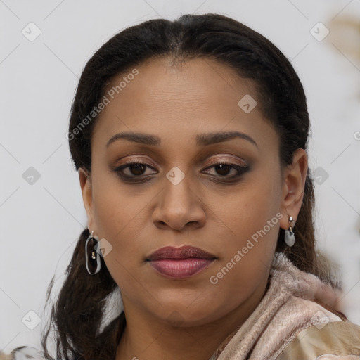 Joyful latino young-adult female with medium  brown hair and brown eyes