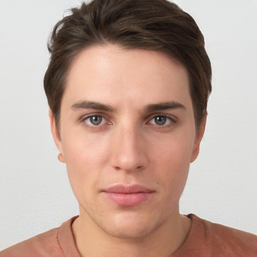 Neutral white young-adult male with short  brown hair and grey eyes