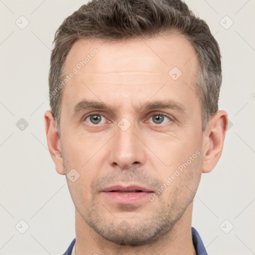 Neutral white adult male with short  brown hair and brown eyes