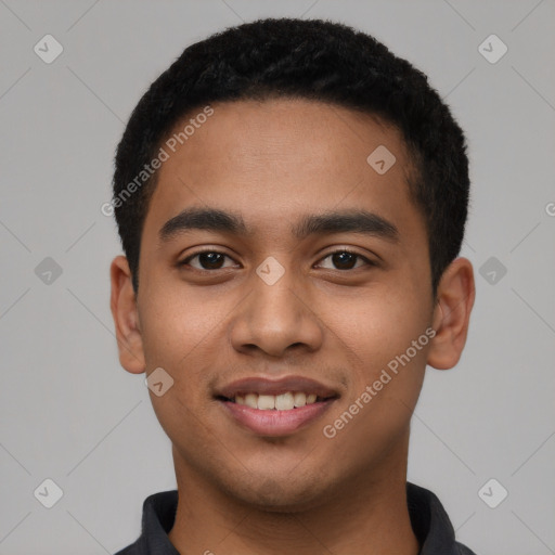 Joyful latino young-adult male with short  black hair and brown eyes