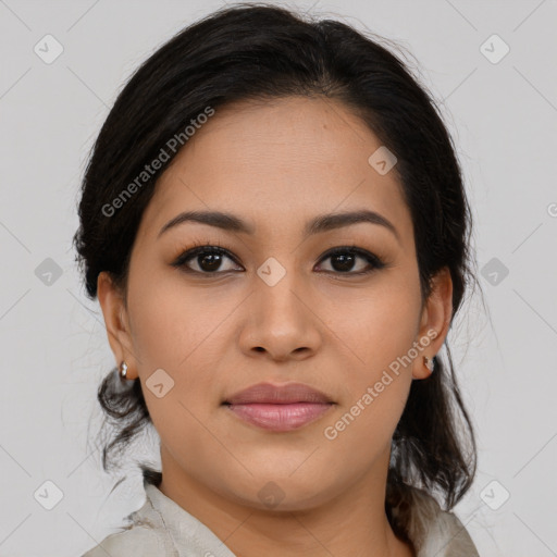 Joyful latino young-adult female with medium  brown hair and brown eyes