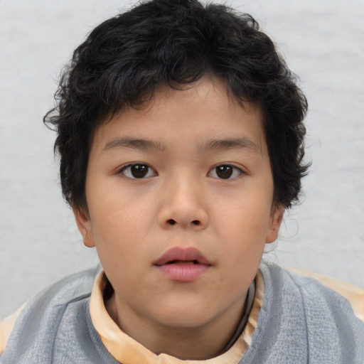 Neutral asian child male with short  brown hair and brown eyes