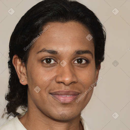 Joyful black adult female with short  brown hair and brown eyes