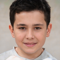 Joyful white child male with short  brown hair and brown eyes