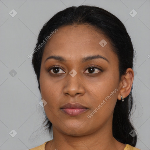 Neutral black young-adult female with medium  black hair and brown eyes