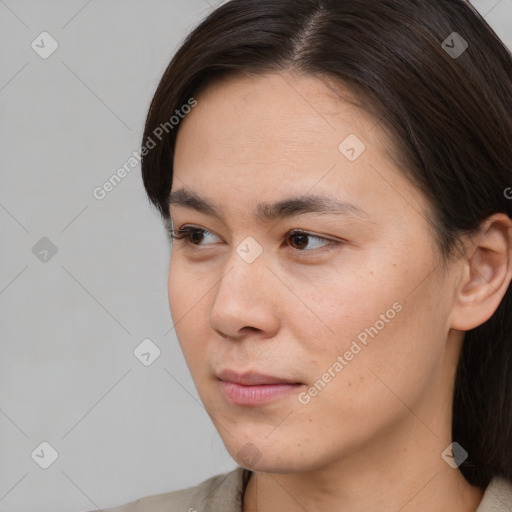 Neutral white young-adult female with medium  brown hair and brown eyes