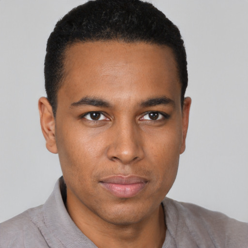 Neutral black young-adult male with short  black hair and brown eyes