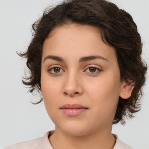 Neutral white young-adult female with medium  brown hair and brown eyes