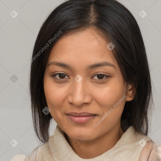 Joyful black young-adult female with medium  brown hair and brown eyes