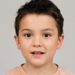 Joyful white child male with short  brown hair and brown eyes