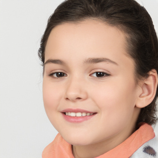 Joyful white child female with medium  brown hair and brown eyes