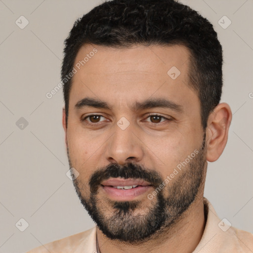 Neutral white young-adult male with short  black hair and brown eyes