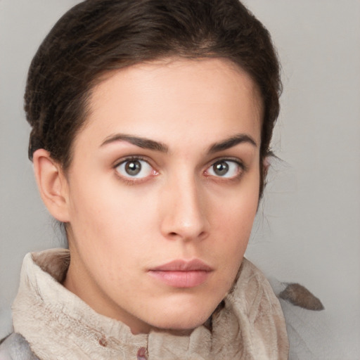 Neutral white young-adult female with short  brown hair and brown eyes