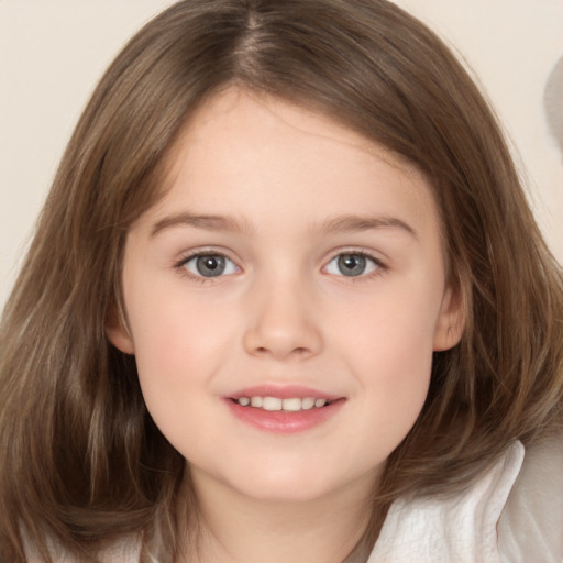 Joyful white child female with medium  brown hair and brown eyes