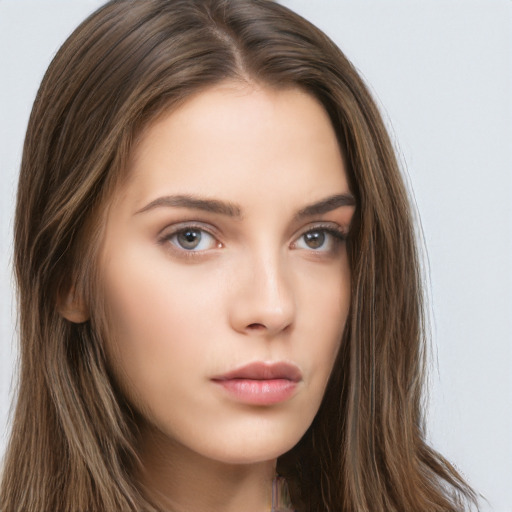 Neutral white young-adult female with long  brown hair and brown eyes