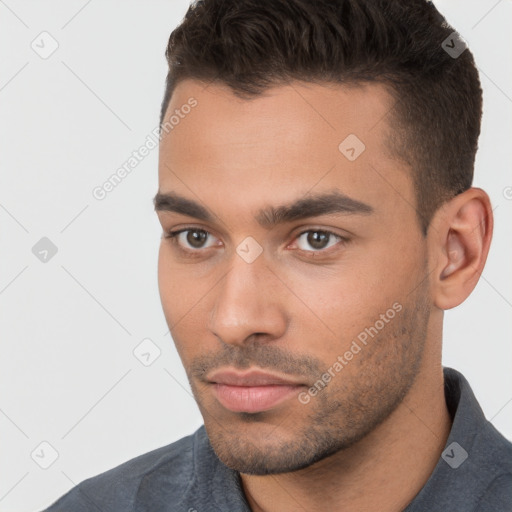 Neutral white young-adult male with short  brown hair and brown eyes