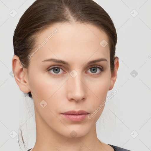 Neutral white young-adult female with medium  brown hair and grey eyes