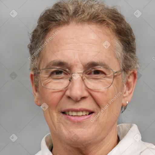 Joyful white middle-aged male with short  brown hair and brown eyes