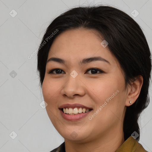 Joyful asian young-adult female with medium  brown hair and brown eyes