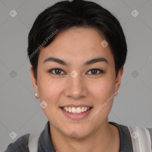 Joyful asian young-adult female with short  brown hair and brown eyes