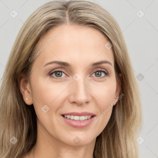 Joyful white young-adult female with long  brown hair and grey eyes