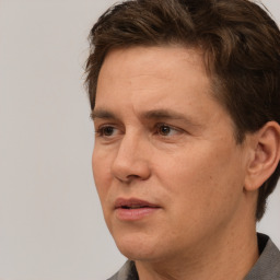 Neutral white adult male with short  brown hair and brown eyes