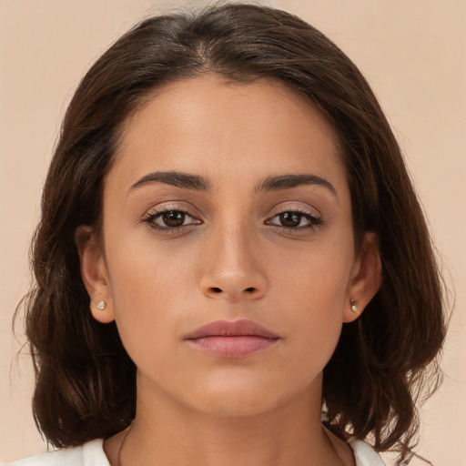 Neutral white young-adult female with medium  brown hair and brown eyes