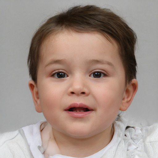 Joyful white child female with short  brown hair and brown eyes