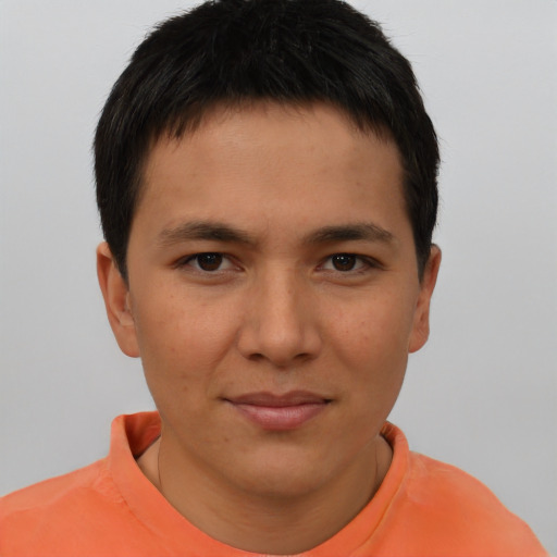 Joyful asian young-adult male with short  brown hair and brown eyes