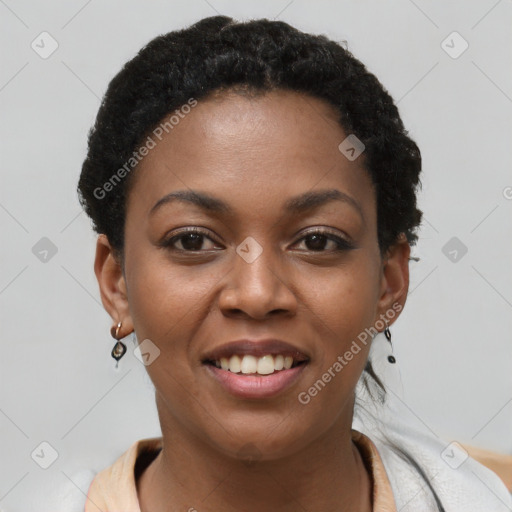 Joyful latino young-adult female with short  black hair and brown eyes