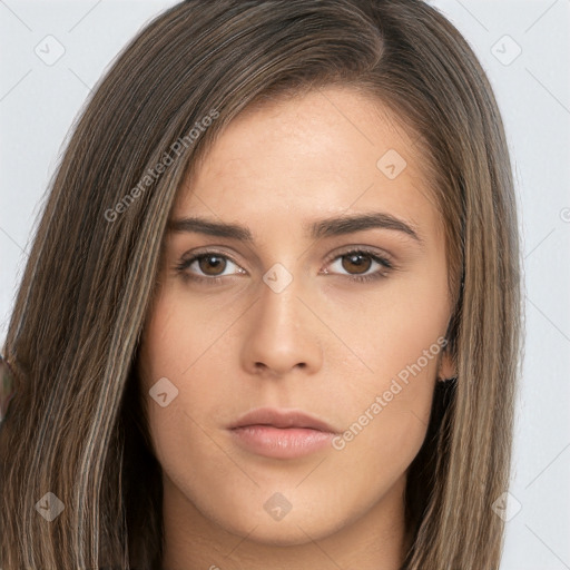 Neutral white young-adult female with long  brown hair and brown eyes