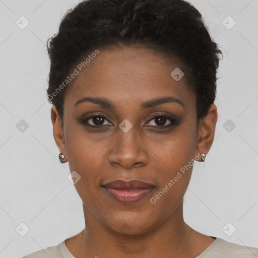 Joyful black young-adult female with short  brown hair and brown eyes