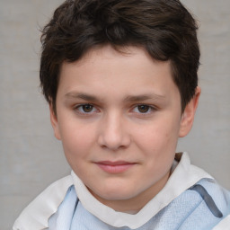 Joyful white child male with short  brown hair and brown eyes