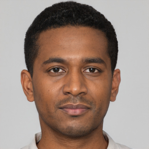 Neutral black young-adult male with short  black hair and brown eyes