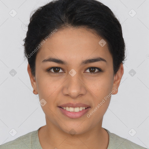 Joyful latino young-adult female with short  brown hair and brown eyes