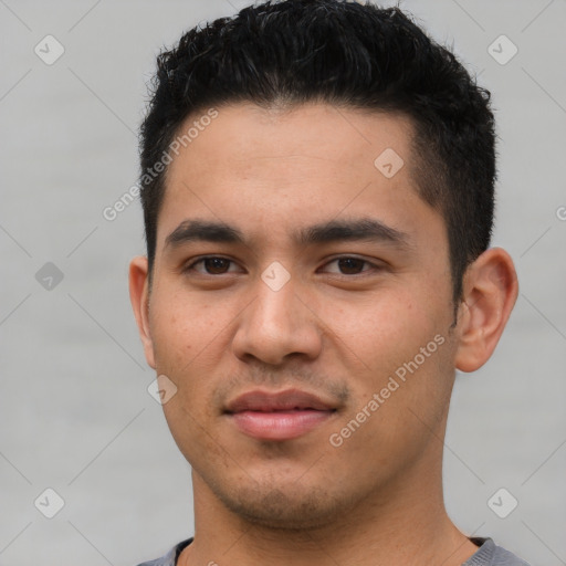 Joyful white young-adult male with short  black hair and brown eyes