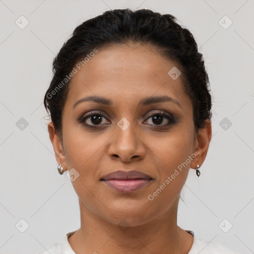 Joyful latino young-adult female with short  brown hair and brown eyes