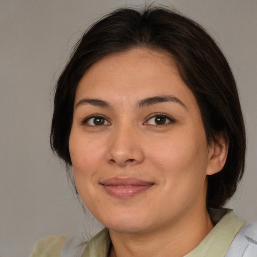 Joyful white young-adult female with medium  brown hair and brown eyes